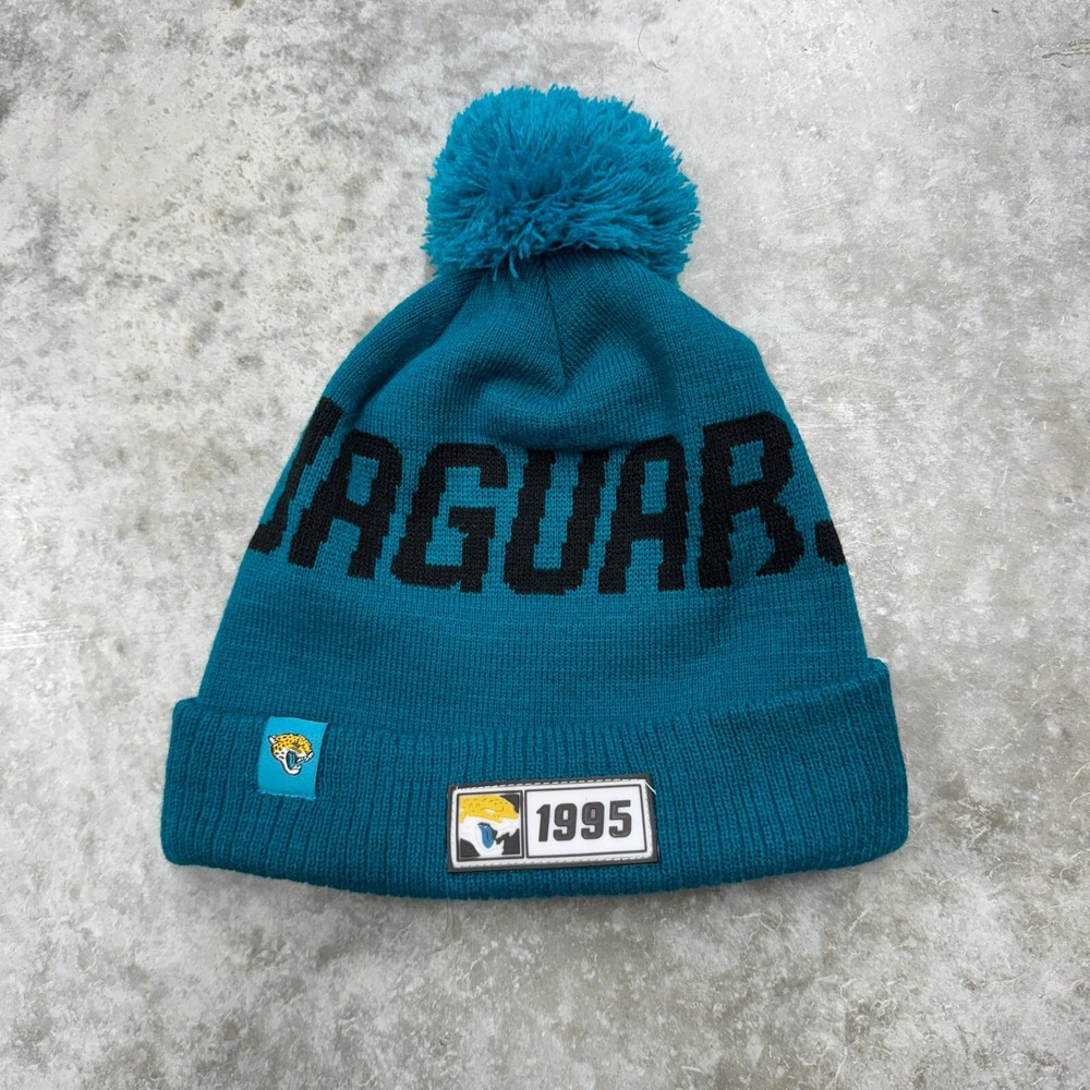 Jacksonville Jaguars New Era Beanie Knit Pom Hat 2019 on field blue 1995