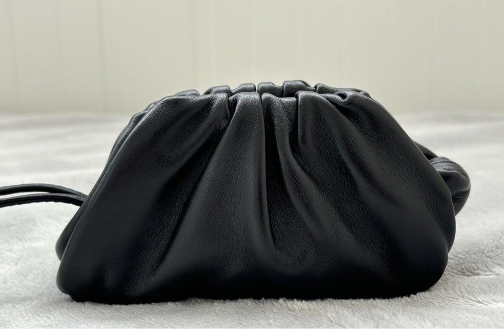 Bottega Veneta The Pouch Handbag in Black with Shoulder Strap and Clutch Option  