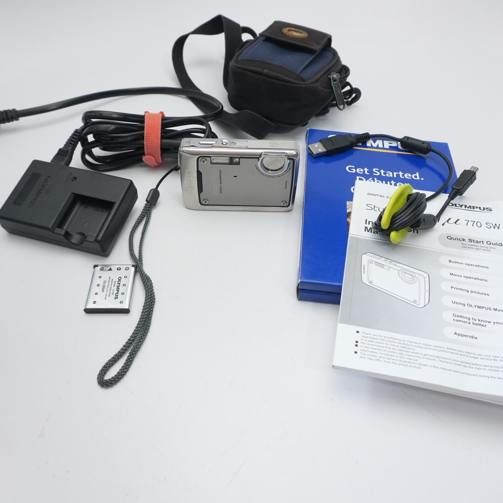 Olympus Stylus 770SW digital camera, 7.1MP, Battery, Charger, Case, Software