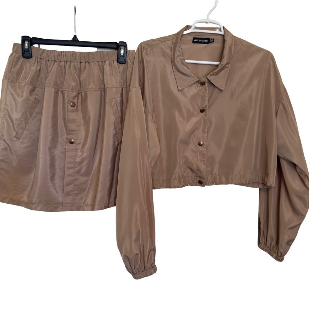 PrettyLittleThing Tan Mini Skirt with Chic Design in Size 10