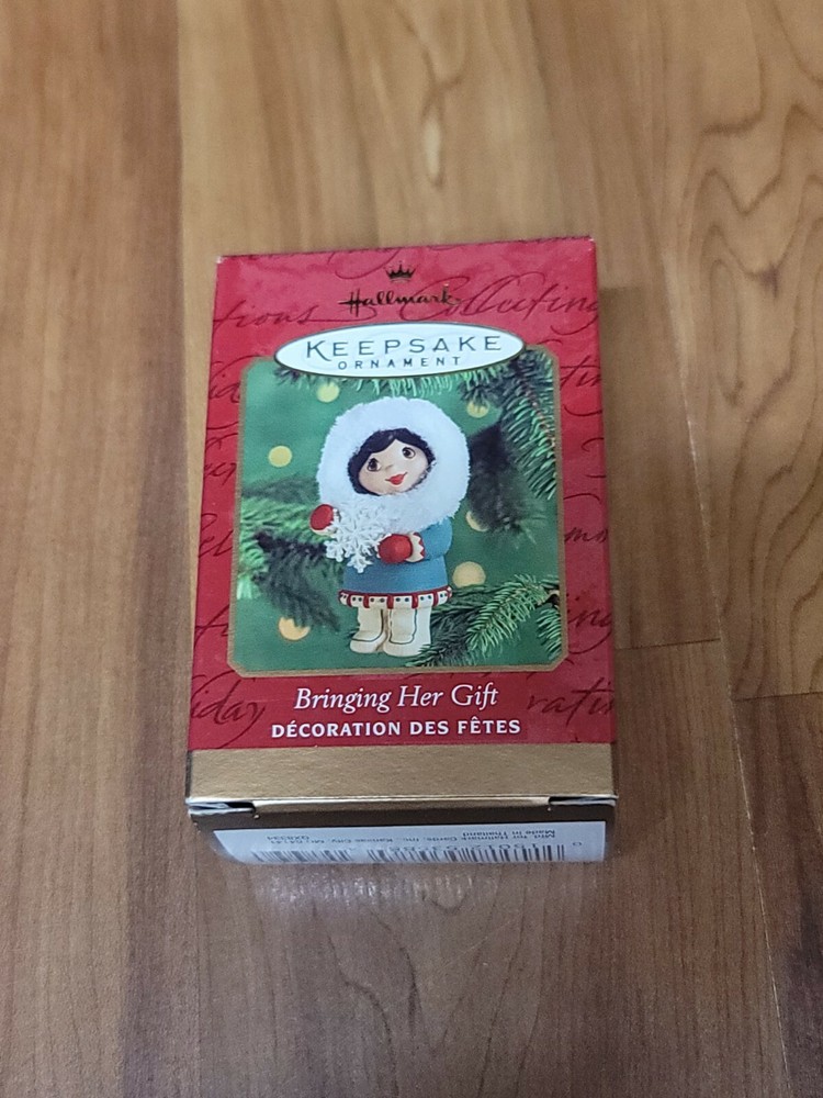 Hallmark 2000 Keepsake Ornament Child Holding Snowflake Gift