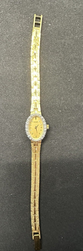 Vintage Pulsar Womens Gold Tone Watch V400 L20 A Gold Tone Band