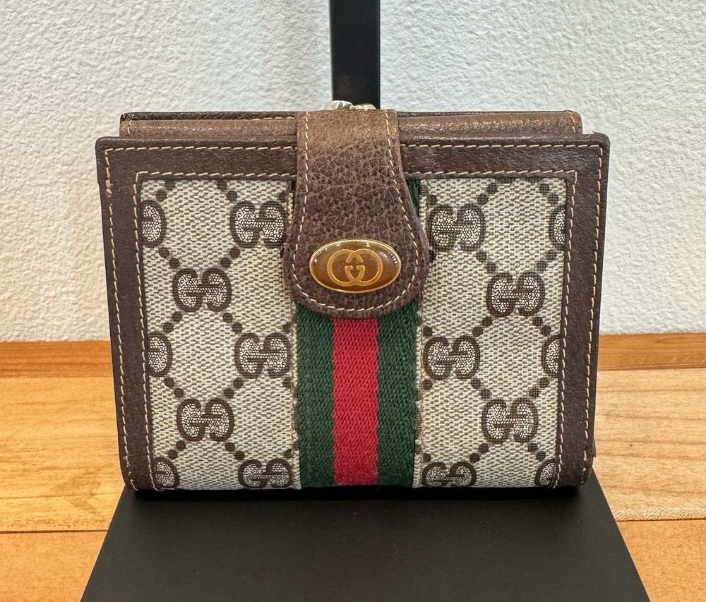 Gucci Vintage GG Supreme Sherry Line Bi-Fold Wallet with Kisslock Closure