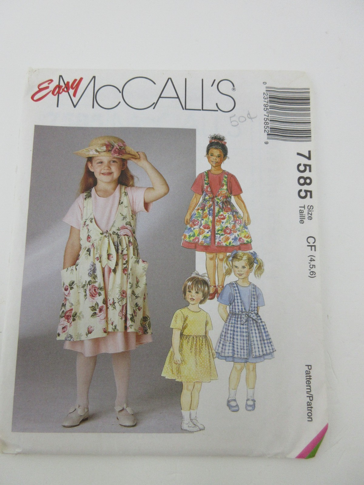 McCall's 7585 Girls Dress and Apron Sewing Pattern Sizes 4 5 6 Uncut 1990s