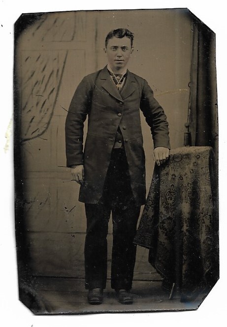 Tintype Photo Man Standing by a Table Pink Cheeks and Gold Chain  Delphis Lareau
