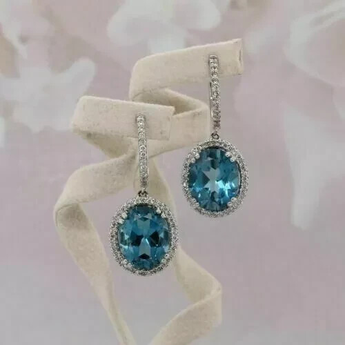 4Ct Oval London Blue Topaz Dangle Earrings in 14K White Gold