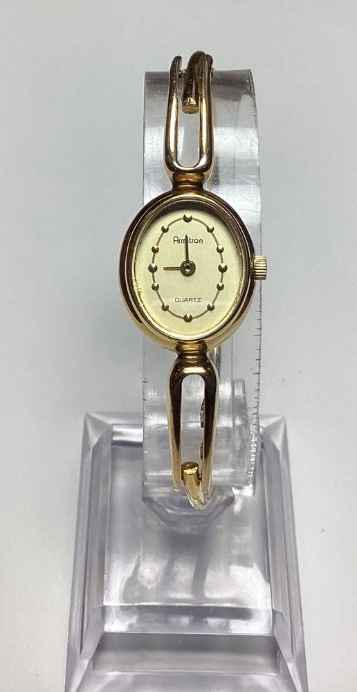 Armitron Womens Watch Gold Tone Oval Slim Bangle Adjustable New Battery