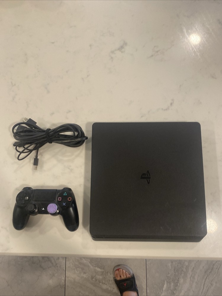 PS4 Slim 1TB Console with Wireless Controller and HD Gaming